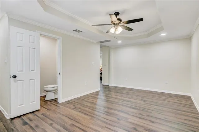 a bathroom with a toilet a sink and shower