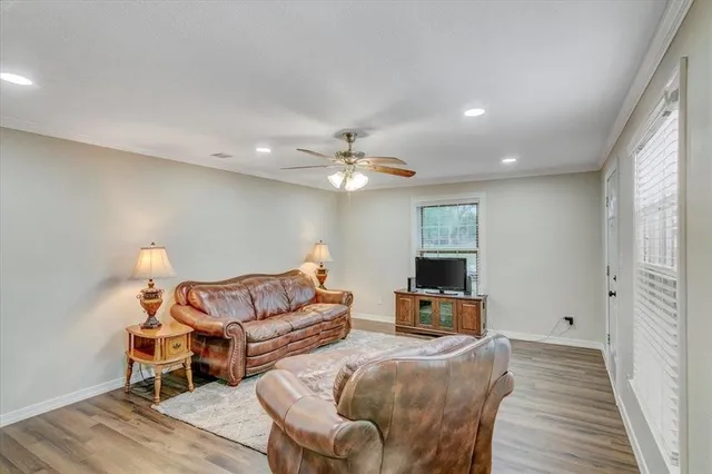 a kitchen with stainless steel appliances a stove refrigerator sink and microwave