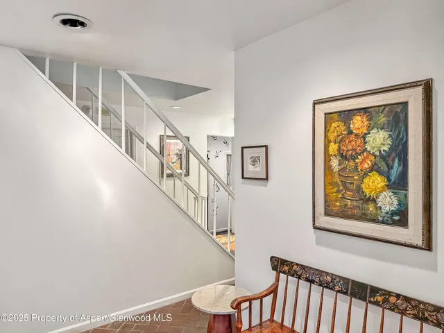 a view of entryway with wooden floor