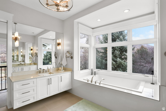 1354 South 800 East Mapleton, UT 84664 - Photo 38 of 129 Full bath featuring hanging lights, vanity, and plenty of natural light