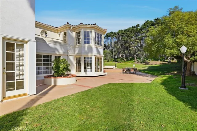 a view of a building with a yard