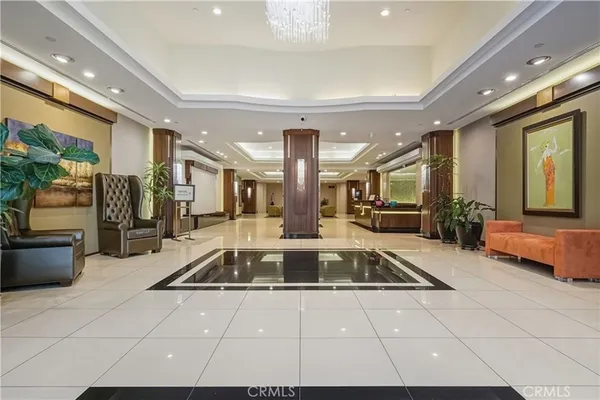 an aerial view of a building with parking space