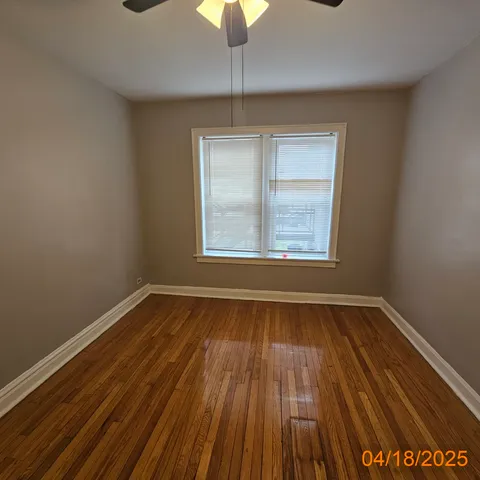 a view of empty room with windows