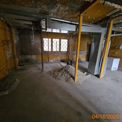 a view of a backyard of the house