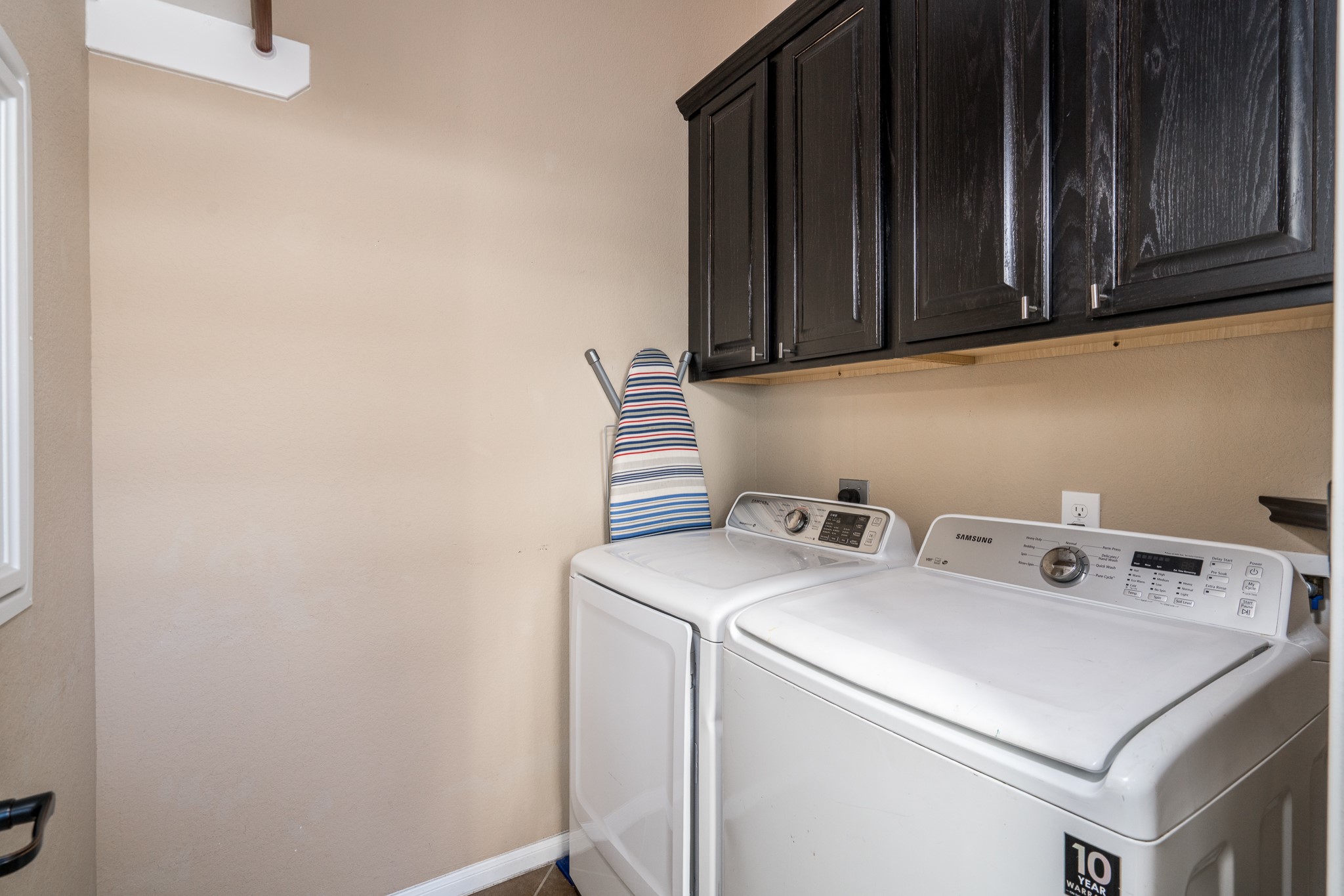 9115 Monarch Mist Lane Houston, TX 77070 - Photo 22 of 26 a utility room with dryer and washer