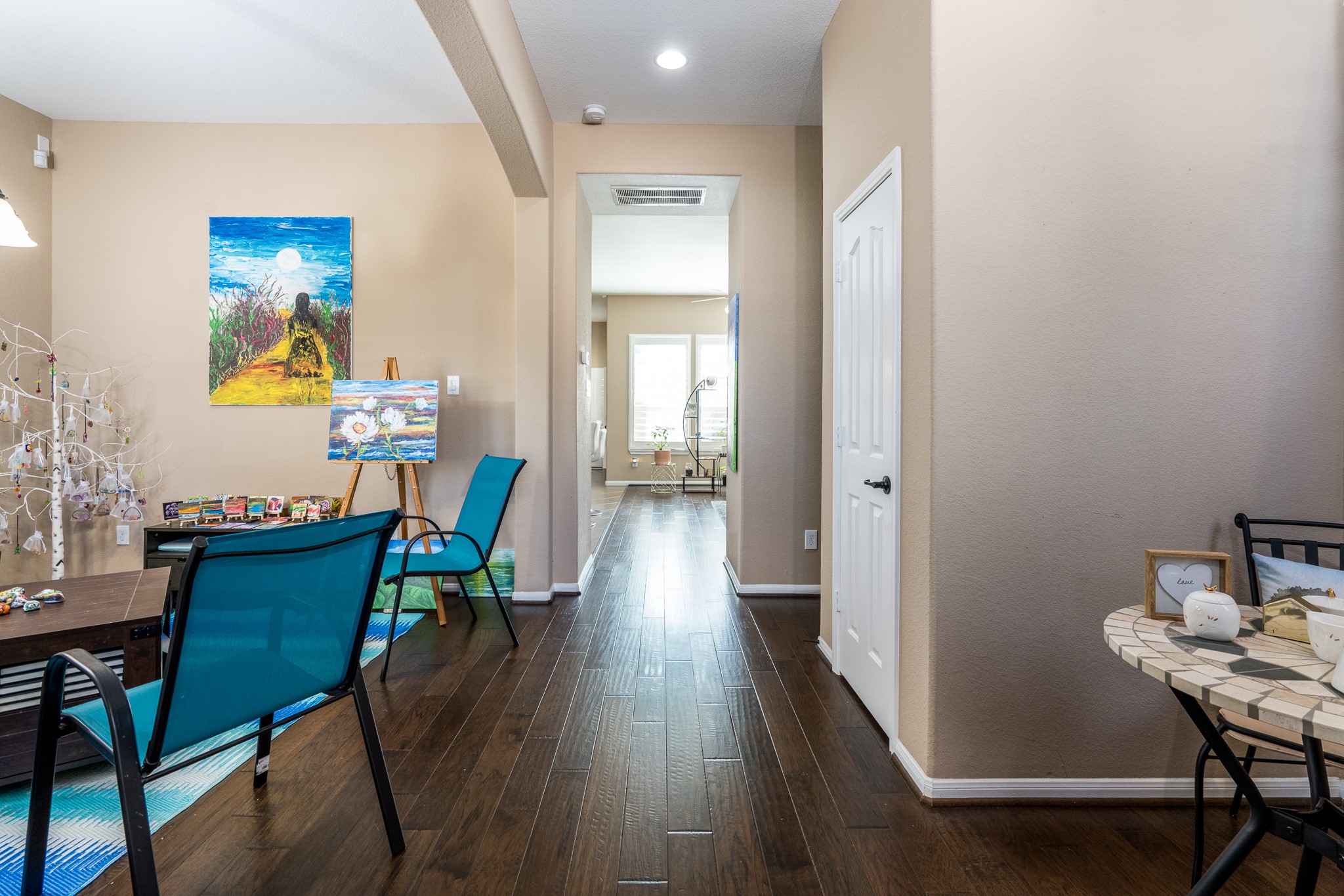 9115 Monarch Mist Lane Houston, TX 77070 - Photo 4 of 26 a view of a dining room with furniture and wooden floor