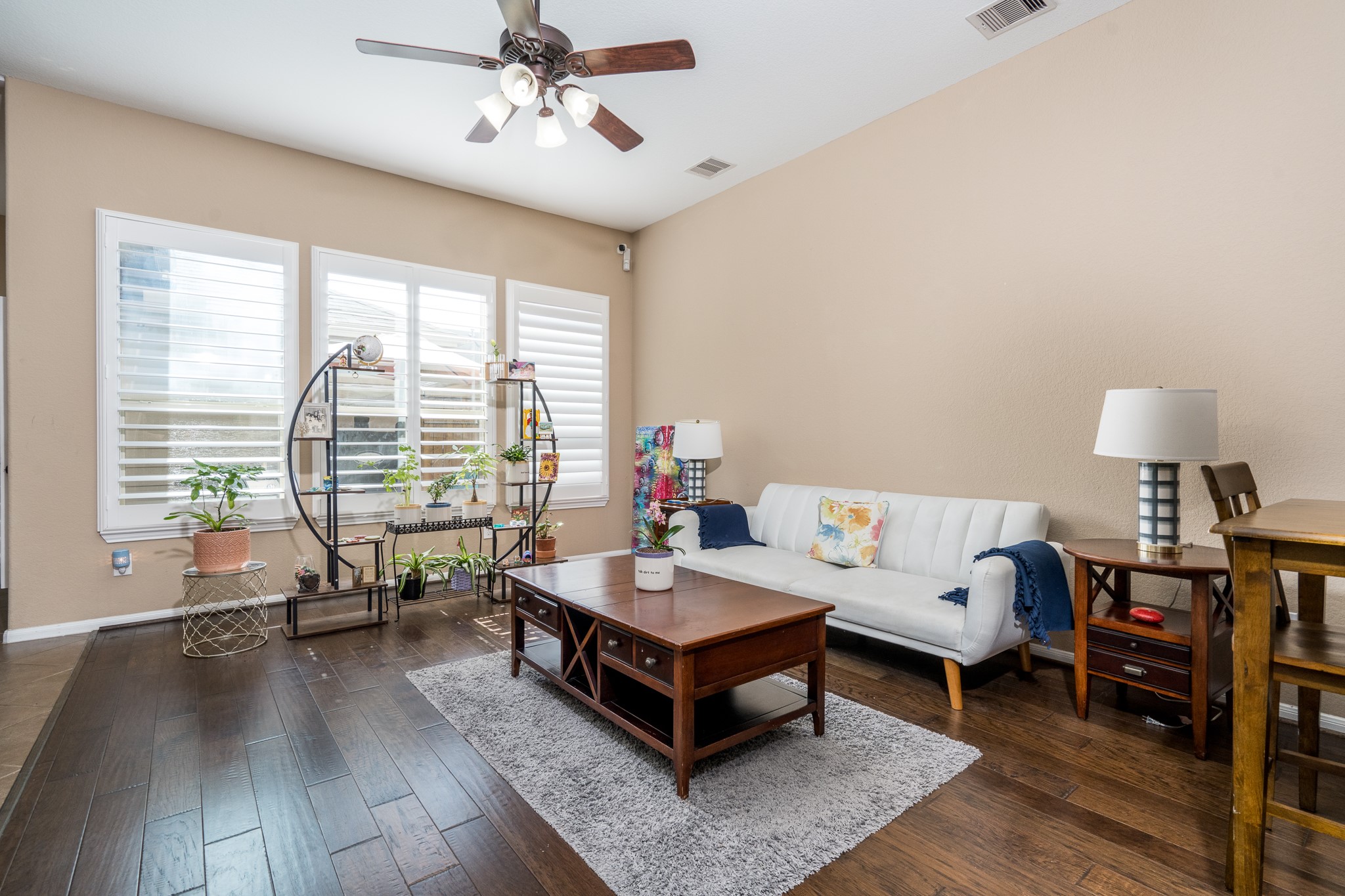 9115 Monarch Mist Lane Houston, TX 77070 - Photo 5 of 26 a living room with furniture and a large window