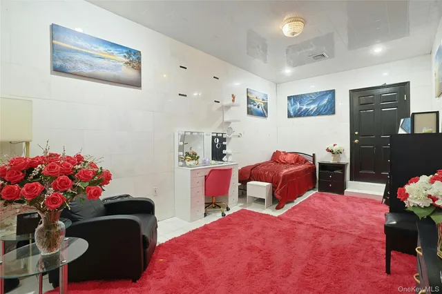 a bedroom with furniture and a bed