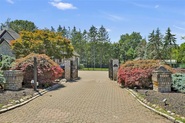 a backyard of a house with lots of green space