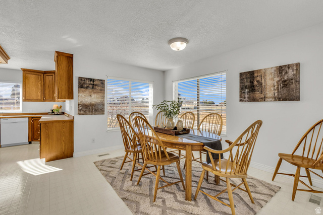 1060 West 2620th Street South Mapleton, UT 84664 - Photo 21 of 87 Dining space featuring light flooring and a textured ceiling