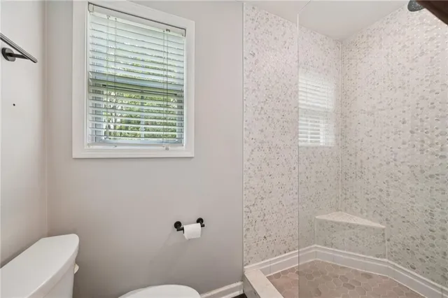a bathroom with sink and window