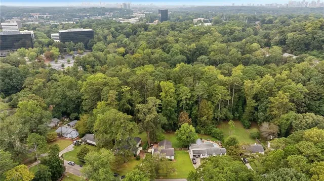an aerial view of a city with lots of residential buildings