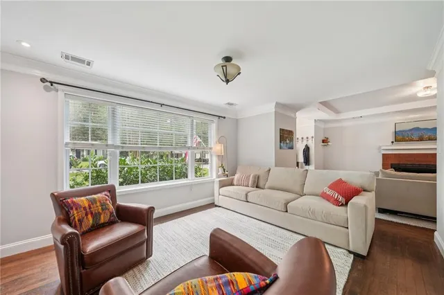 a living room with furniture or couch and a window