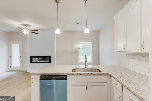 a view of a room with racks on the wall