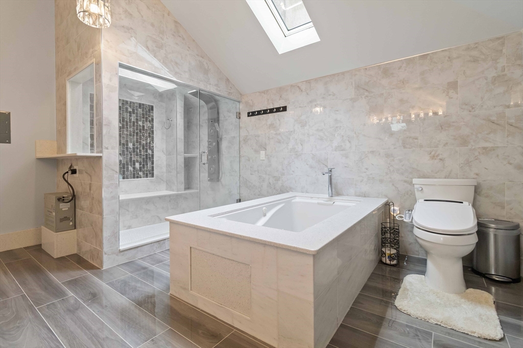 141 Gardiner Road Quincy, MA 02169 - Photo 21 of 39 a bathroom with a sink toilet and shower