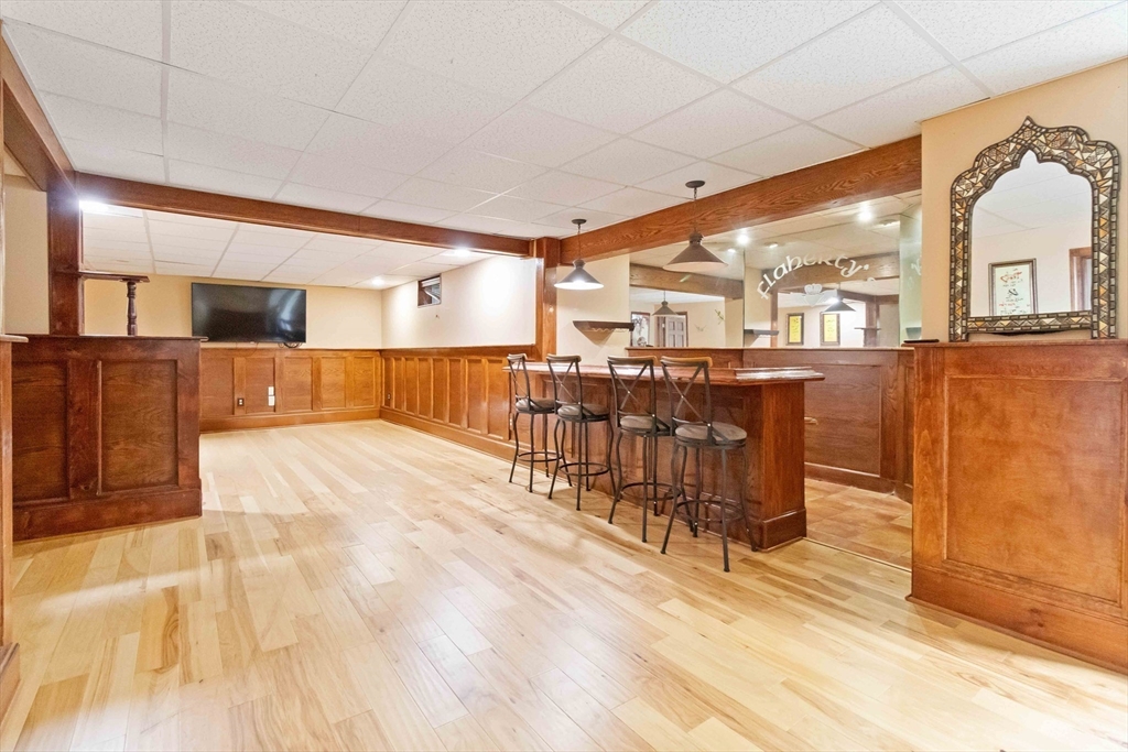 141 Gardiner Road Quincy, MA 02169 - Photo 29 of 39 a view of a kitchen with furniture and wooden floor