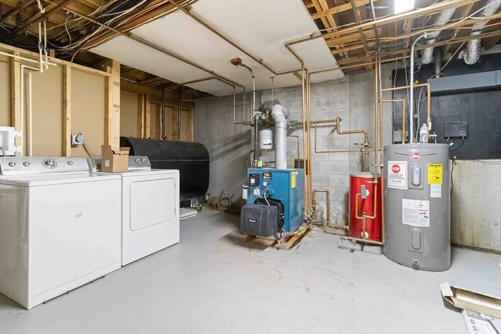 141 Gardiner Road Quincy, MA 02169 - Photo 36 of 39 a utility room with dryer and washer