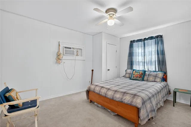 a living room with furniture and flowers