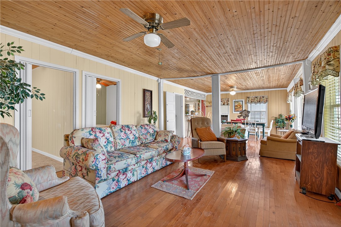 107 Lakefield Drive East Mathis, TX 78368 - Photo 22 of 33 a living room with furniture fireplace and a large window
