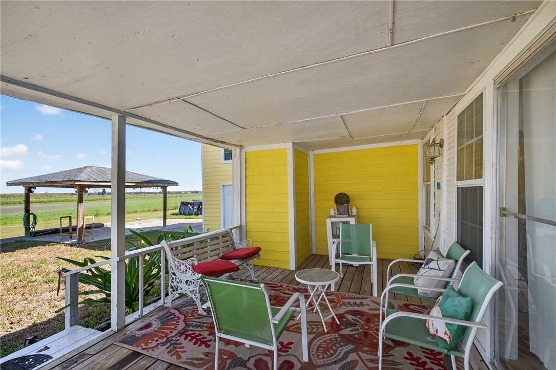 107 Lakefield Drive East Mathis, TX 78368 - Photo 26 of 33 a room with musical instrument pool table and windows