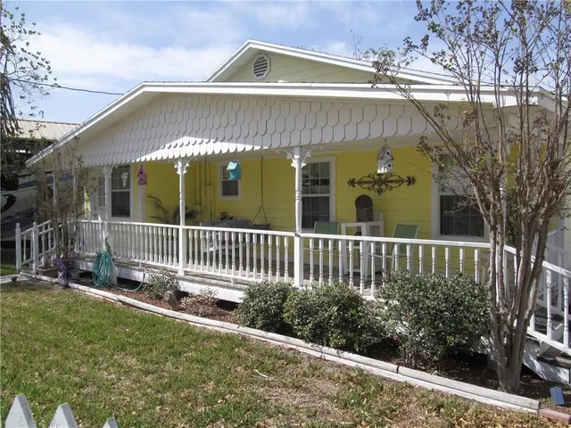 a front view of a house with a porch