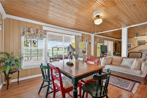 a room with furniture and wooden floor