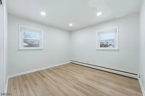 an aerial view of a yard with table and chairs