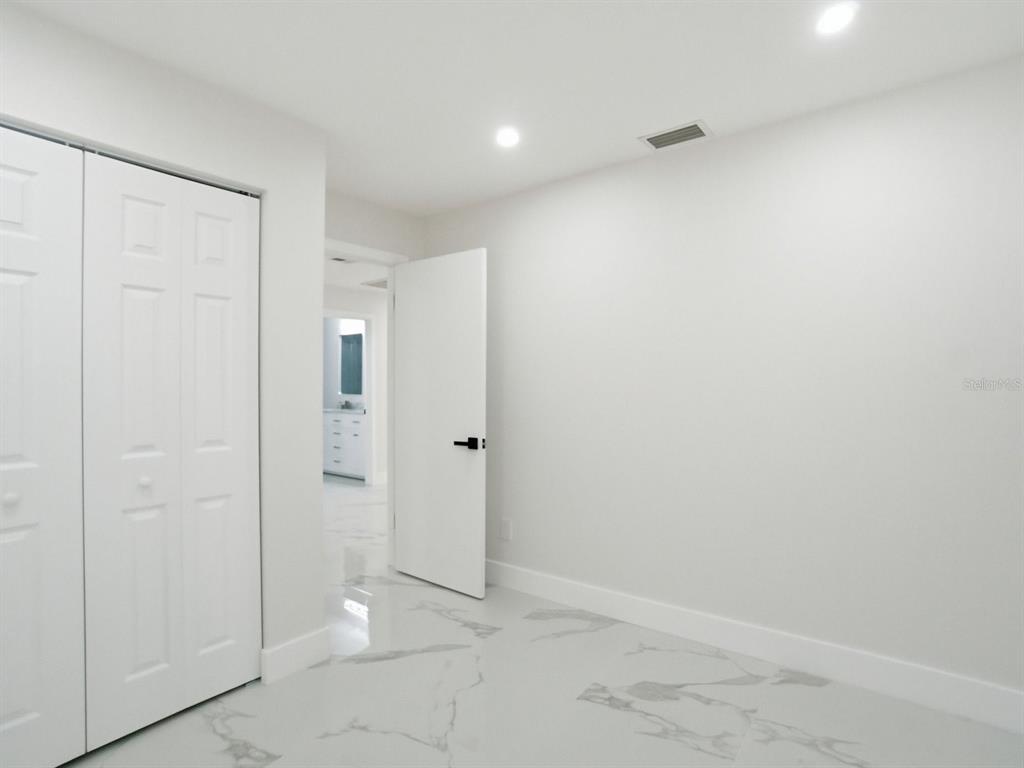 390 Hazel Circle Punta Gorda, FL 33982 - Photo 27 of 44 a view of an empty room