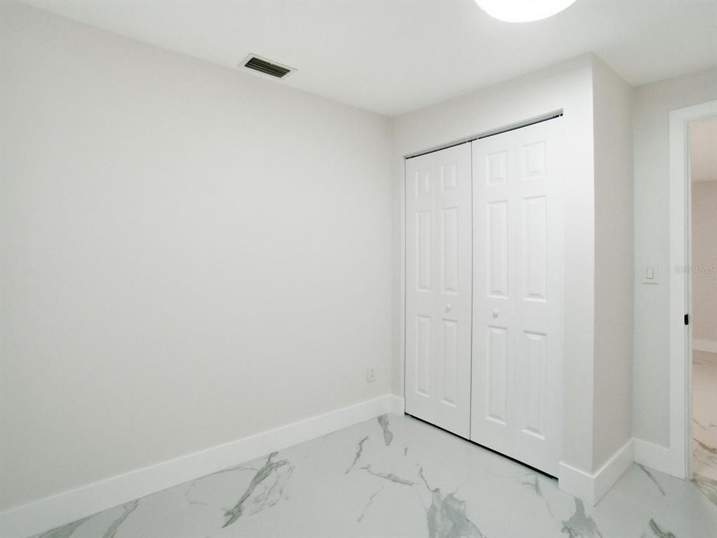 390 Hazel Circle Punta Gorda, FL 33982 - Photo 29 of 44 a view of an empty room