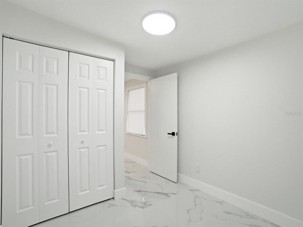 390 Hazel Circle Punta Gorda, FL 33982 - Photo 30 of 44 a view of an empty room