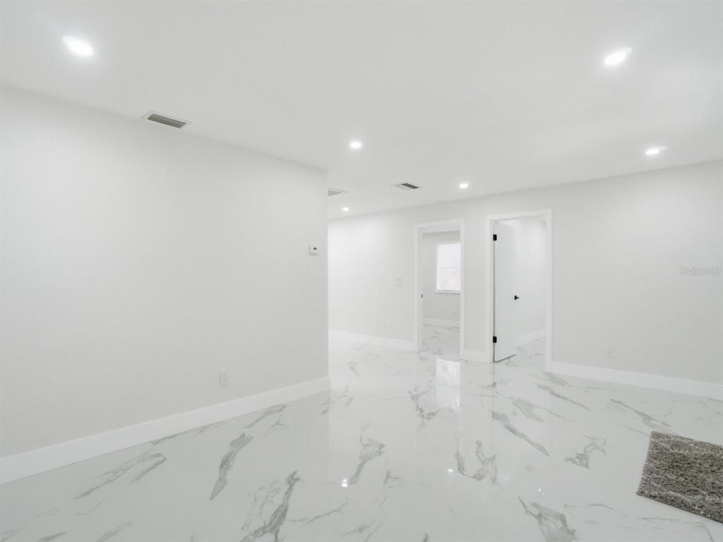 390 Hazel Circle Punta Gorda, FL 33982 - Photo 7 of 44 a view of an empty room