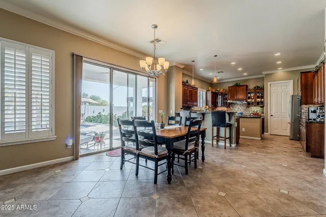 a white refrigerator freezer sitting next to a window