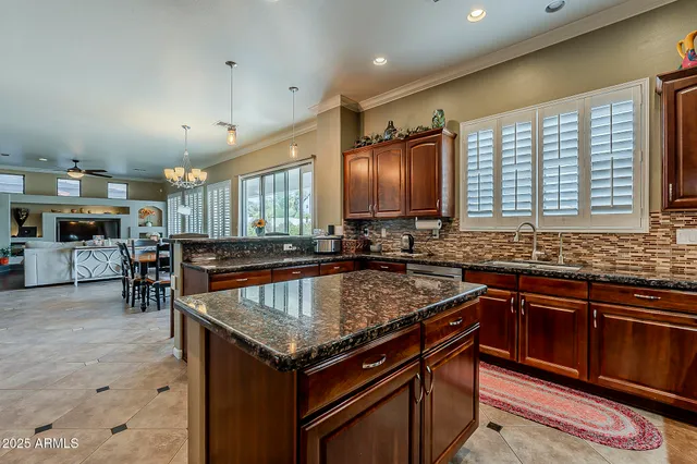 a bed room with a bed and a television