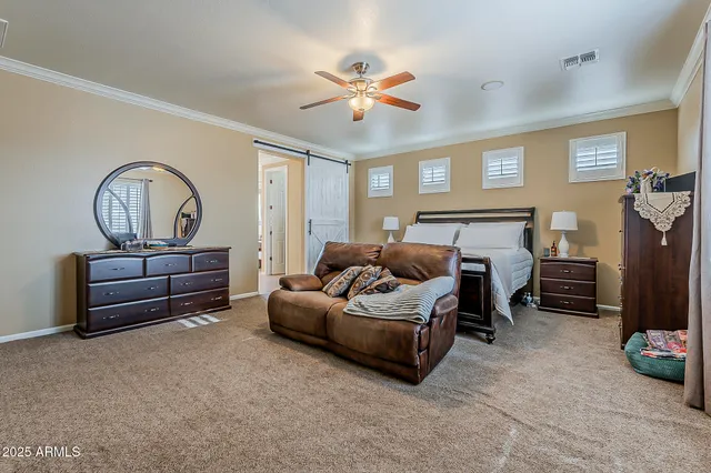 a bathroom with a shower sink and mirror