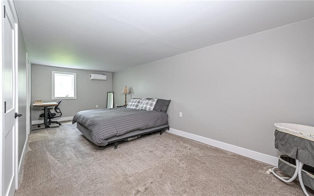 2559 Nicholson Road Sewickley, PA 15143 - Photo 13 of 24 Huge brand new lower level 25x10 primary bedroom with walk in closet.