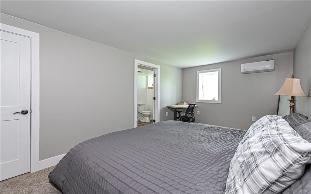 2559 Nicholson Road Sewickley, PA 15143 - Photo 14 of 24 This primary bedroom offers the perfect retreat with added privacy.