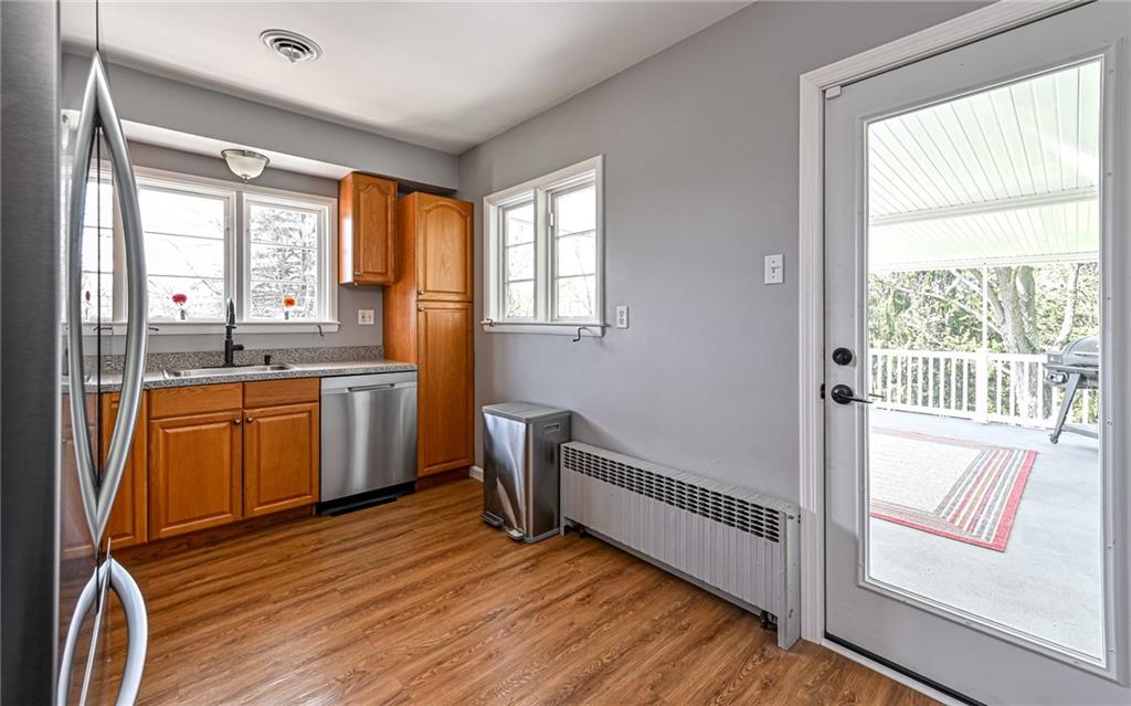 2559 Nicholson Road Sewickley, PA 15143 - Photo 8 of 24 Expansive covered patio is easily accessible through kitchen making outdoor cooking a breeze.