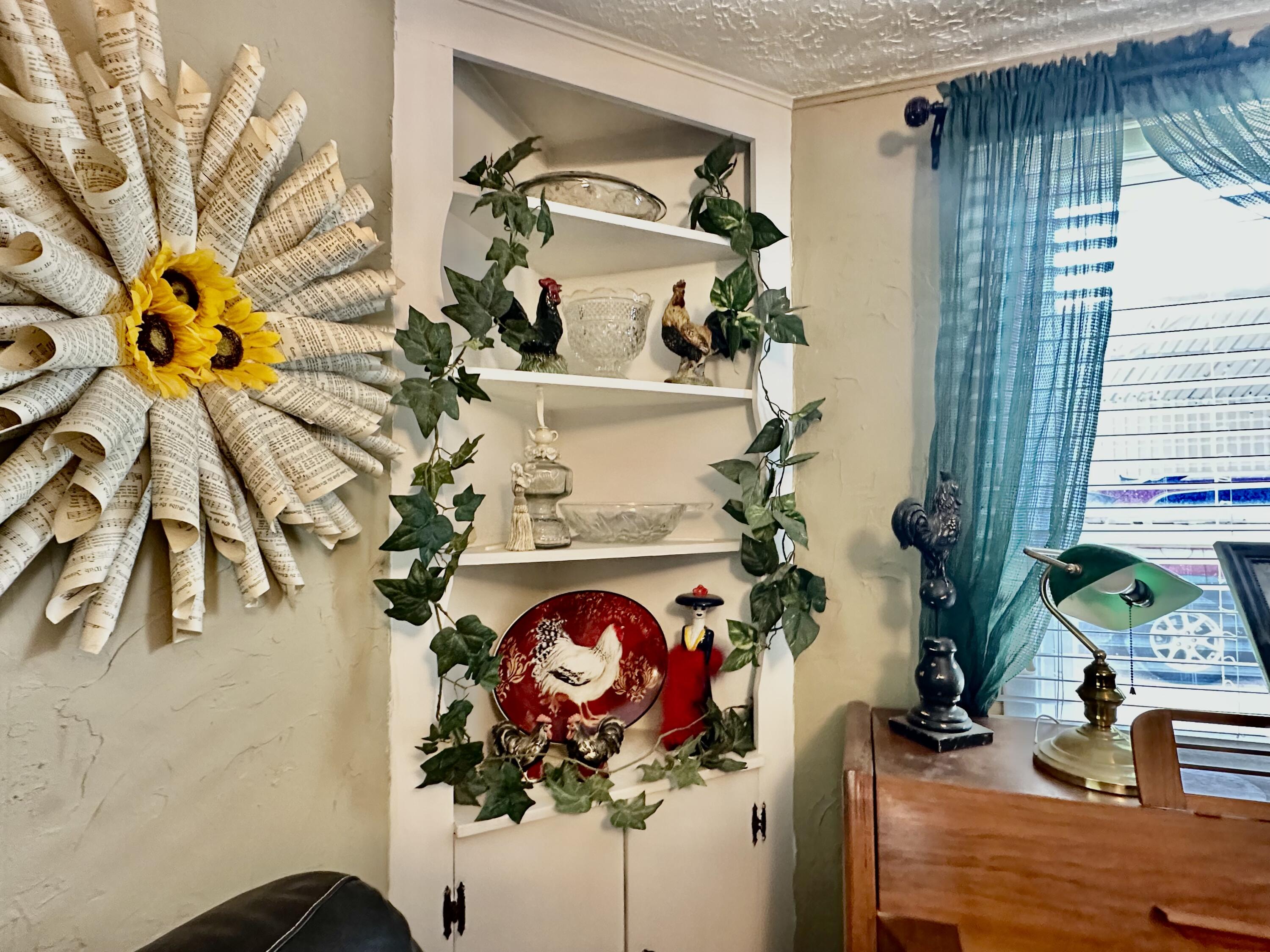 600 Mulberry Street Turkey, TX 79261 - Photo 13 of 29 a vase of flowers sitting on a table