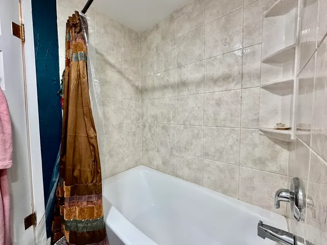 a bathroom with a bathtub