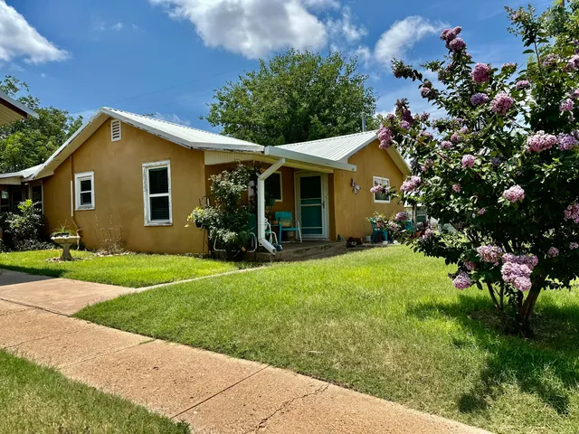 a view of outdoor space yard and front view of a house