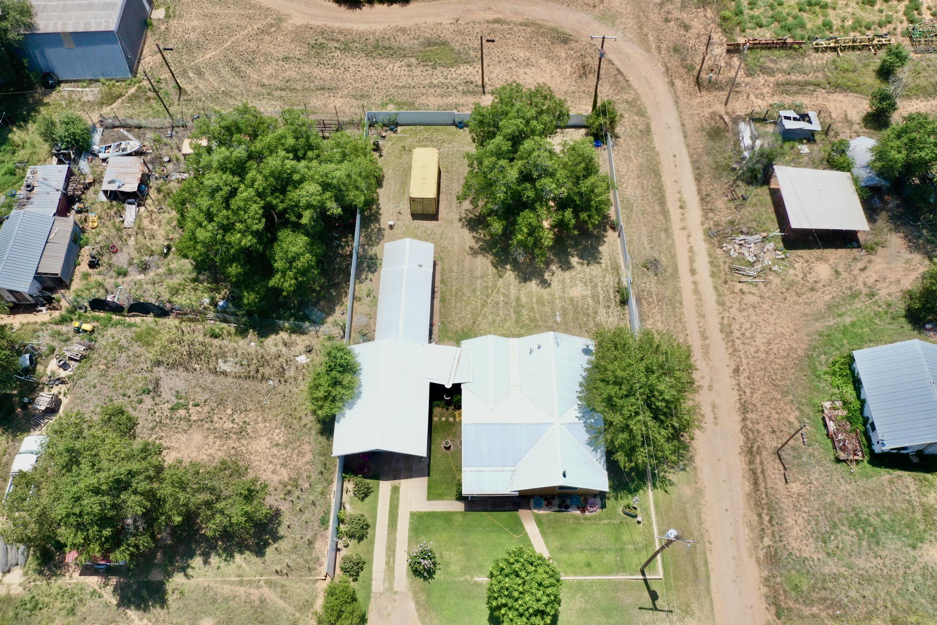 600 Mulberry Street Turkey, TX 79261 - Photo 3 of 29 an aerial view of residential house with outdoor space