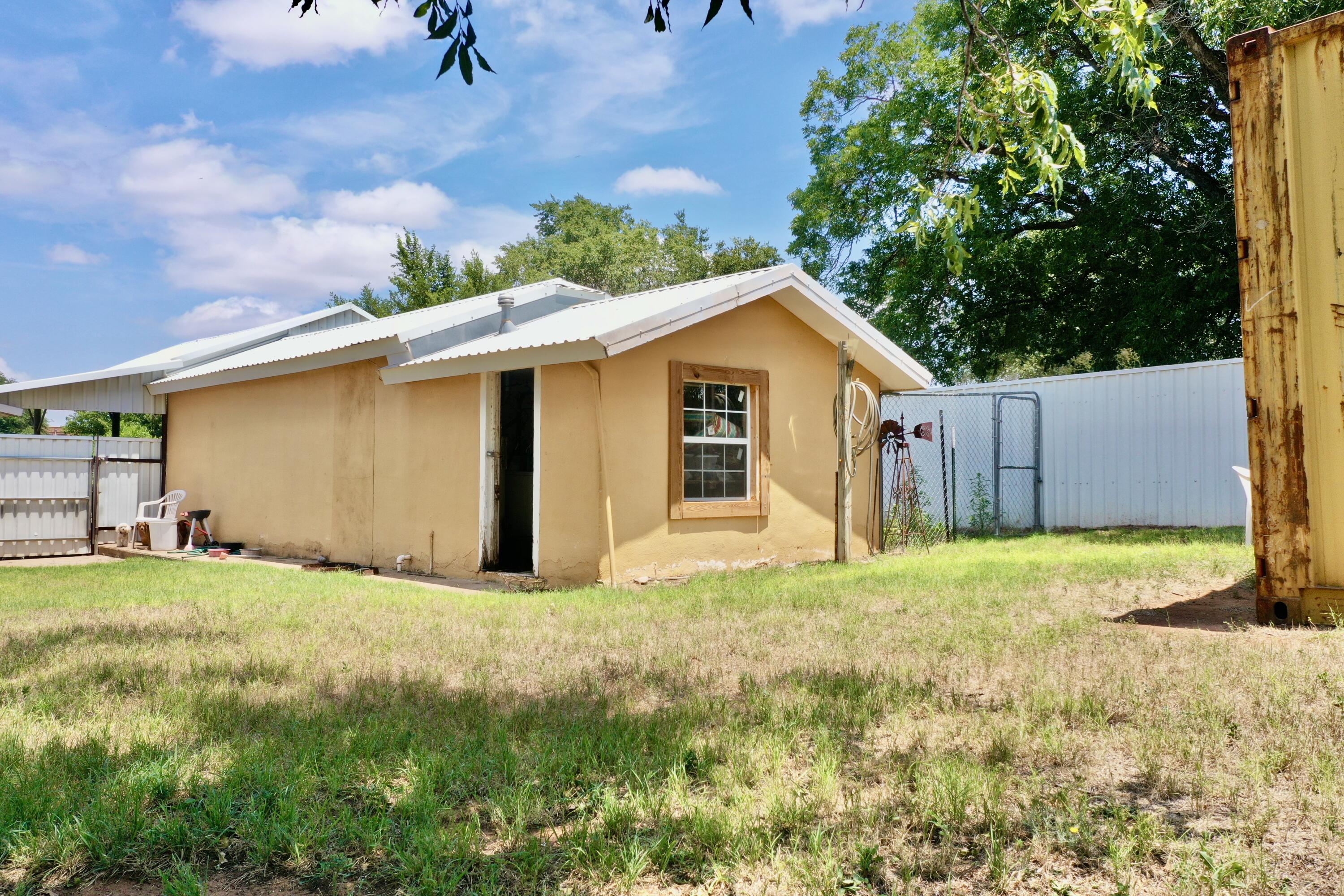 600 Mulberry Street Turkey, TX 79261 - Photo 8 of 29 a big house with an outdoor space