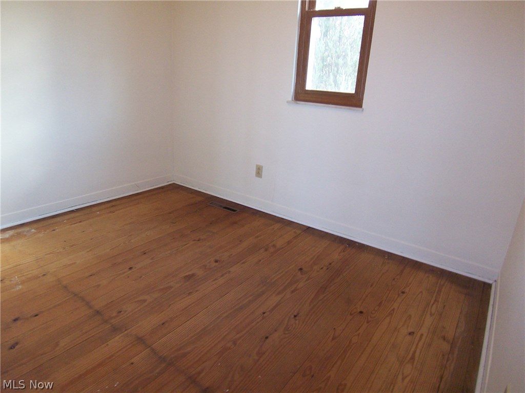 6723 Dupont Road Washington, WV 26181 - Photo 11 of 28 3 Main Bedrooms all have Original Hardwood Floors