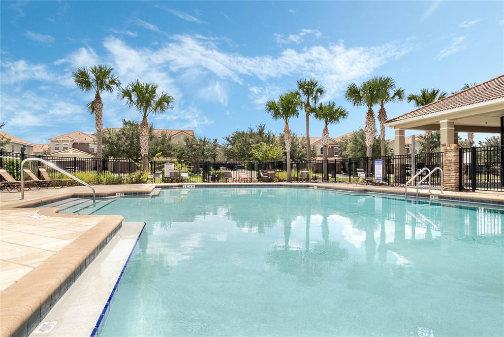 337 Partridge Pea Lane Ocoee, FL 34761 - Photo 36 of 38 a view of a swimming pool with an outdoor seating