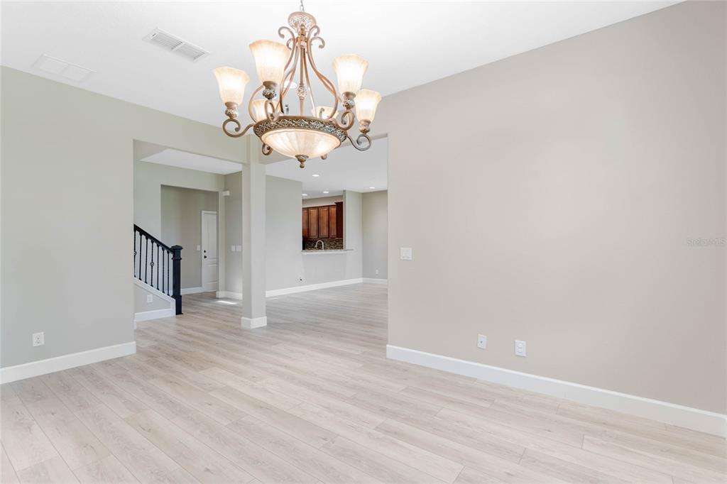 337 Partridge Pea Lane Ocoee, FL 34761 - Photo 8 of 38 a view of a chandelier in a room