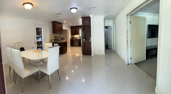 a dining room with furniture