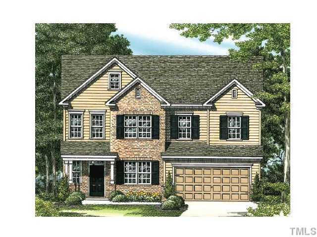 809 Wickham Ridge Road Apex, NC 27539 - Photo 1 of 1 a front view of a house with a yard