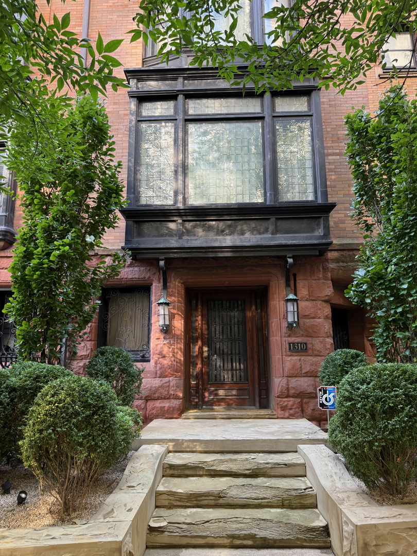 1310 North Astor Street Chicago, IL 60610 - Photo 3 of 33 a view of a house with a porch