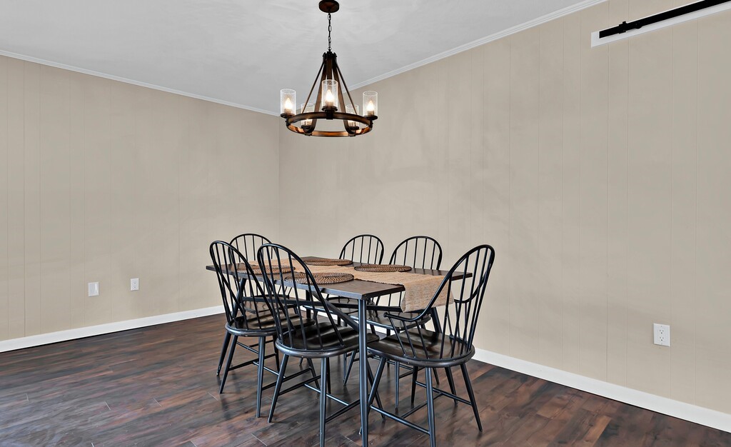 122 Teeling Trail Whitney, TX 76692 - Photo 12 of 31 a view of a dining room with furniture wooden floor and chandelier