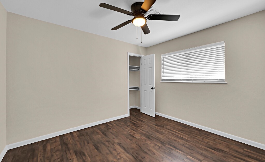 122 Teeling Trail Whitney, TX 76692 - Photo 23 of 31 a view of empty room with wooden floor and fan